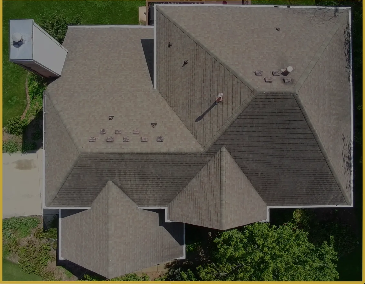 Before: storm-damaged roof restored