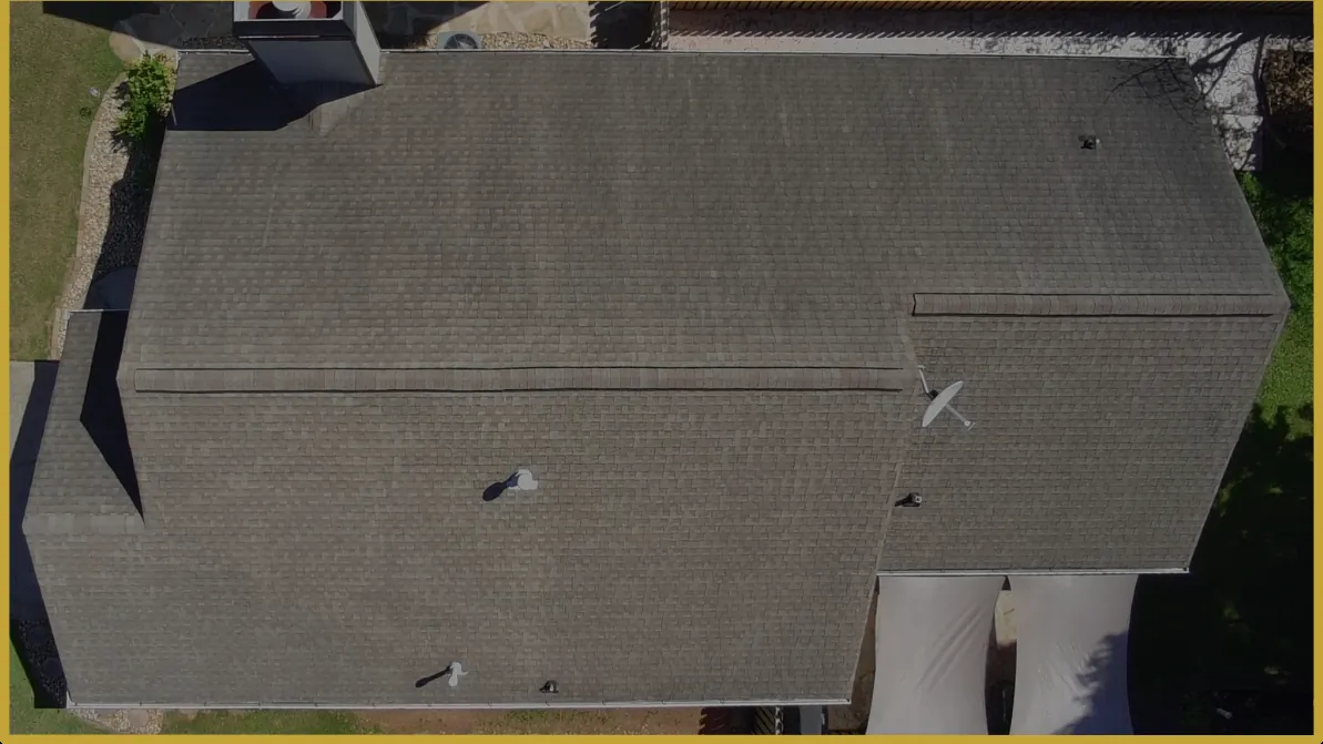 Before: hail-damaged roof replaced