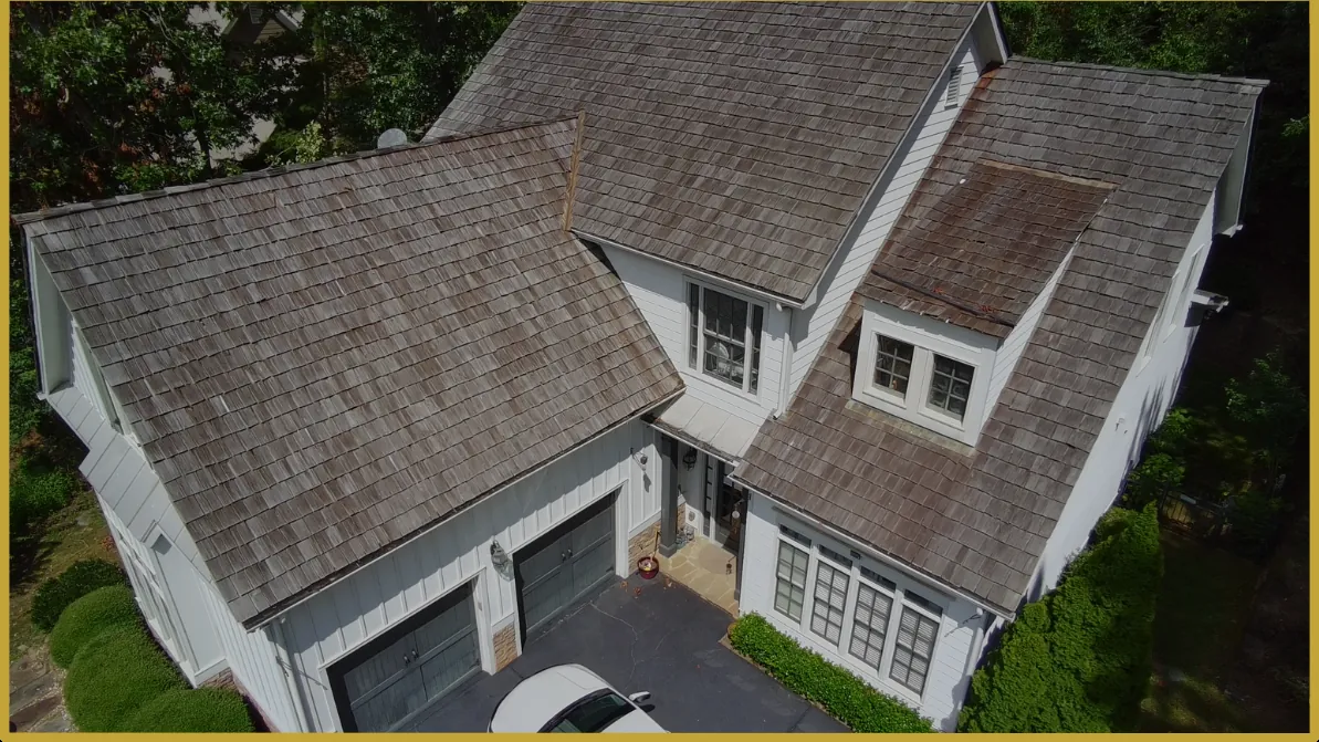 Before: wind-damaged roof rebuilt